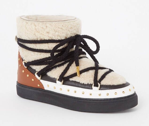 Inuikii Snowboot van schapenwol met leren details